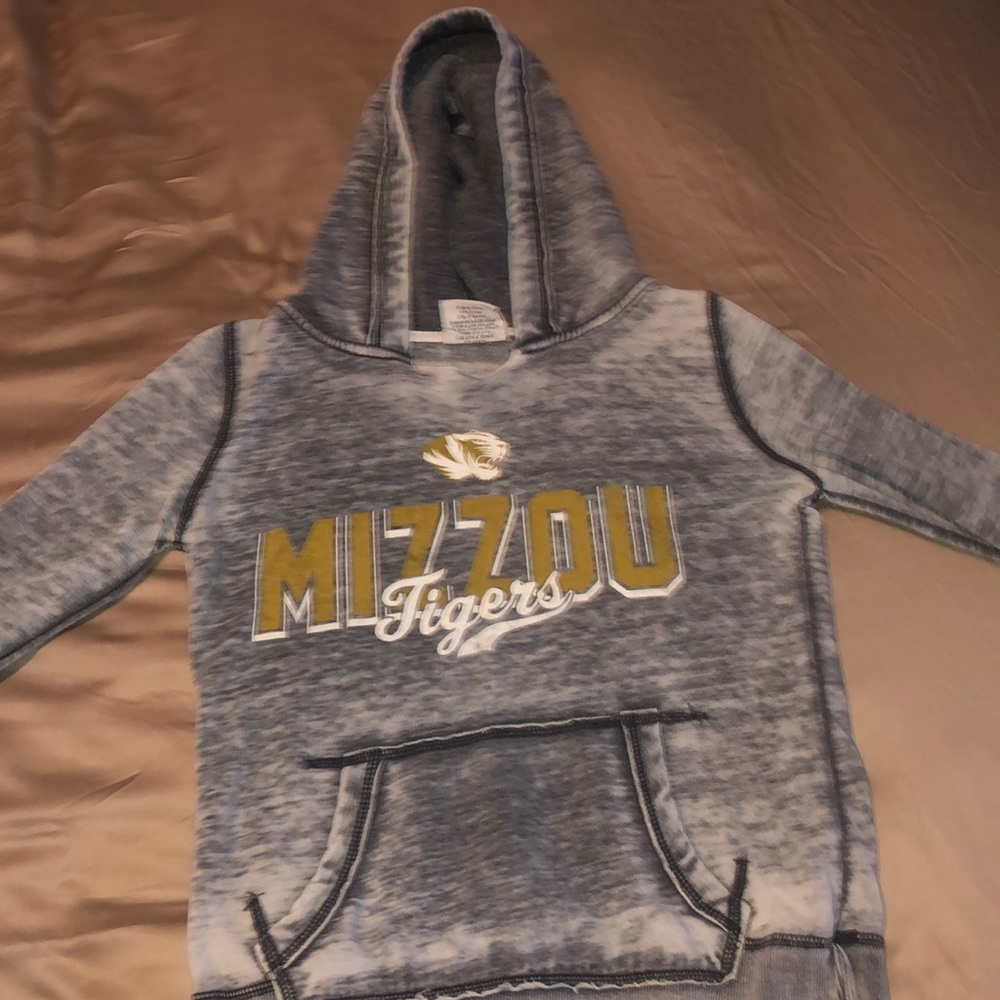 A Missouri Tigers sweatshirt